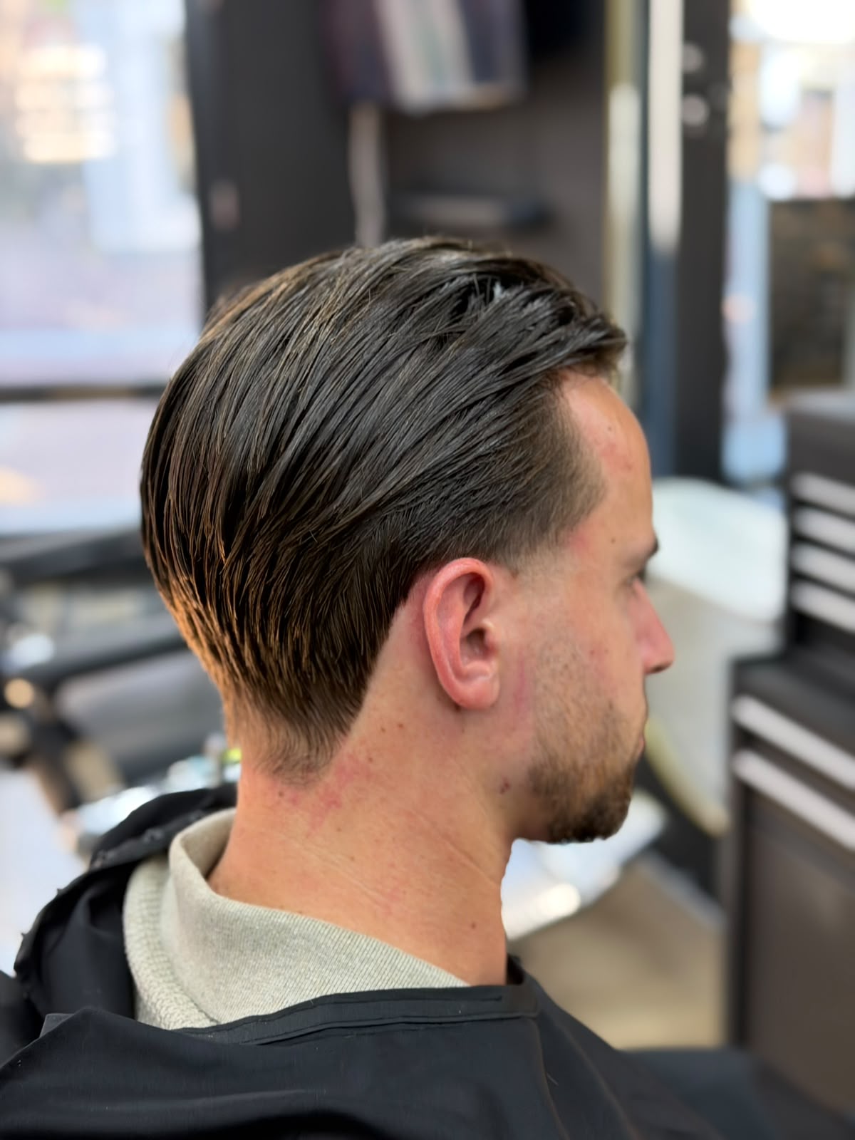 Slick back met taper fade
