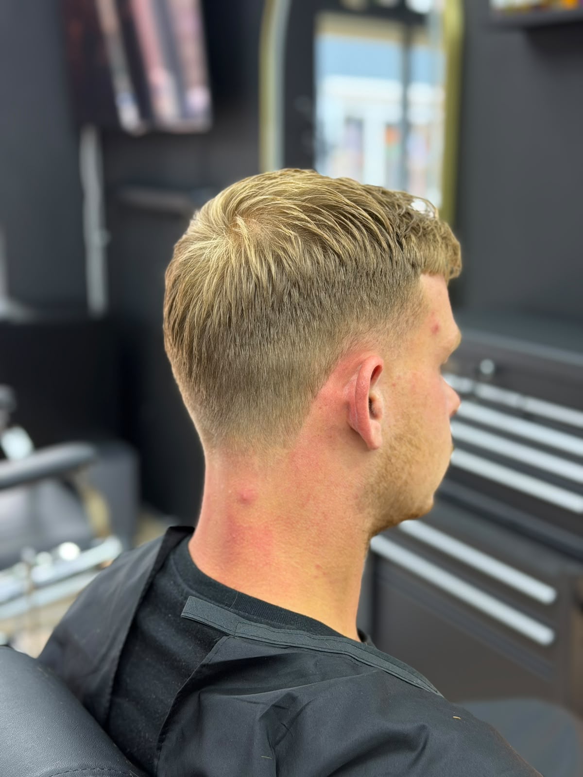 Blonde textured crop met low fade